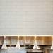 Part of the kitchen and wall at Lena on Tuesday. Daniel Brenner I AnnArbor.com